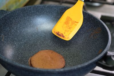 Close-up of egg in frying pan