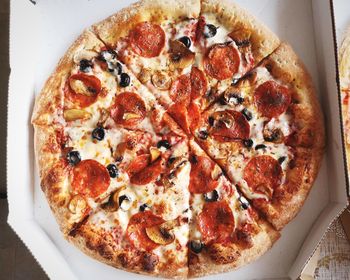 High angle view of pizza in glass on table