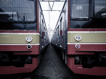 Train on railroad tracks in city