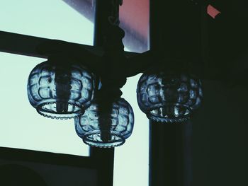 Close-up of electric lamp hanging