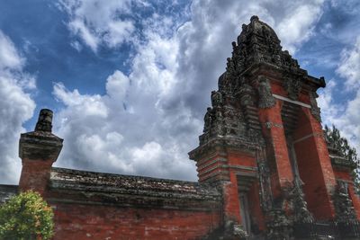 Low angle view of old building against sky