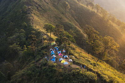 High angle view of people and tents on mountain