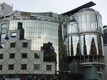 Low angle view of modern building against sky