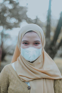 Portrait of woman in park