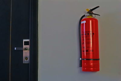 Close-up of red light on wall