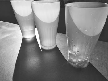 Close-up of empty glasses on table