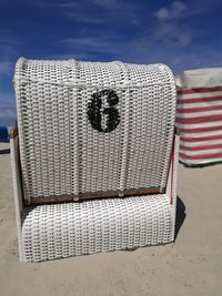 Close-up of sand on beach against sky