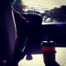 Close-up of young woman sitting outdoors