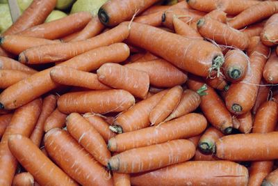 Full frame shot of carrots for sale at market