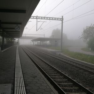 Railroad tracks in foggy weather