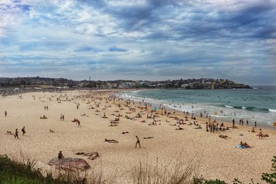 High angle view of people on beach against sky