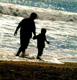 People standing on beach