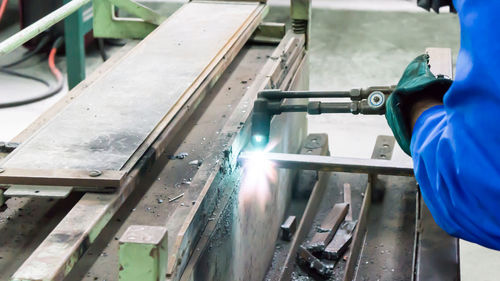 High angle view of man working in factory