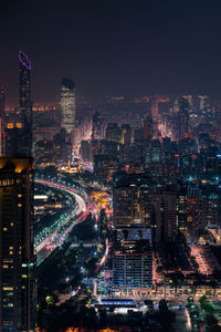 High angle view of illuminated city at night