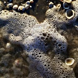 Close-up of pebbles on beach