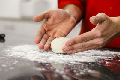 Close-up of person preparing food