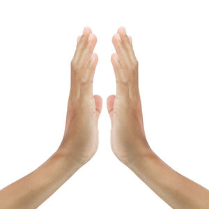 Close-up of human hand against white background