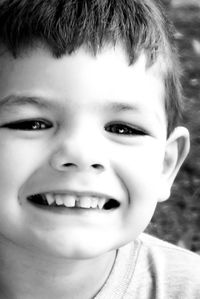 Close-up portrait of smiling boy