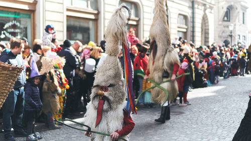 Group of people on street in city