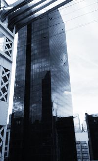 Low angle view of modern building against sky