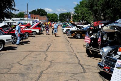 Cars parked on road in city