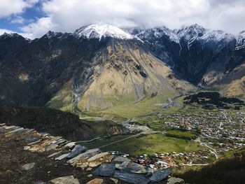 Scenic view of snowcapped mountains against sky