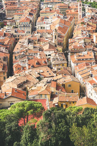 High angle view of townscape and trees in city