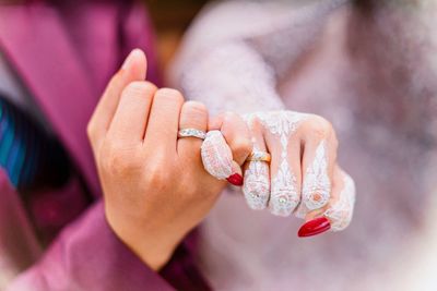 Cropped image of woman holding hands