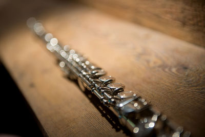 Close-up of wind instrument on table