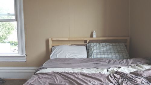 Pillows on bed in bedroom