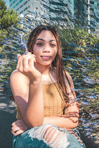 Young woman sitting in swimming pool