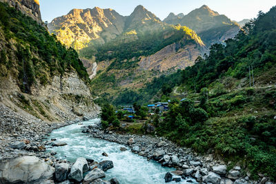 Morning over cold river in manaslu region, nepal