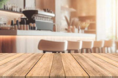 Close-up of wooden table at home