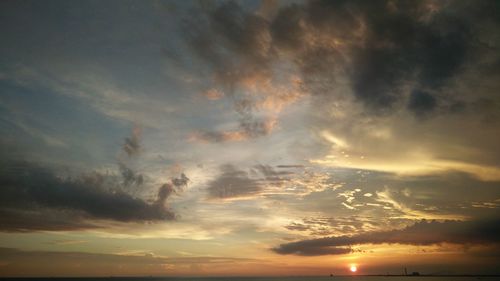 Scenic view of dramatic sky during sunset