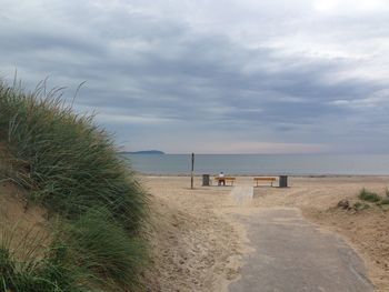 Scenic view of beach against sky