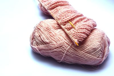High angle view of wool on white background