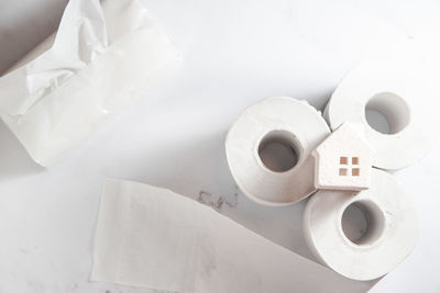 High angle view of papers on white table