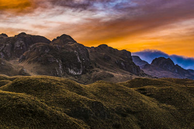 Scenic view of mountains against sky during sunset