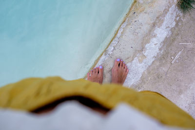 Low section of woman on beach