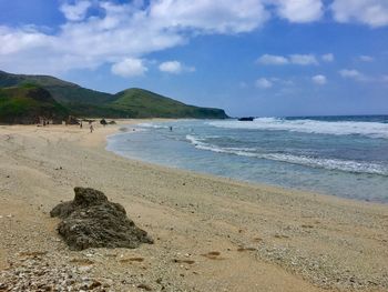 Scenic view of beach against sky