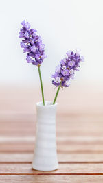 Close-up of flower vase on table