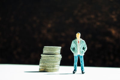Close-up of coins on table