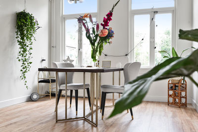 Potted plants on table at home