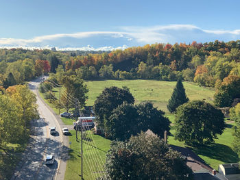 High angle view of trees and buildings against sky