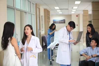 Group of people standing in office