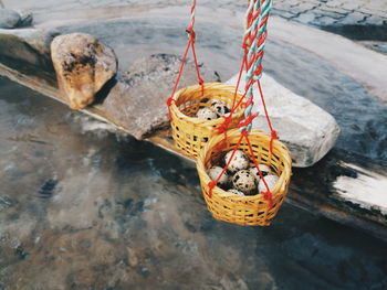 High angle view of rope on rock in sea