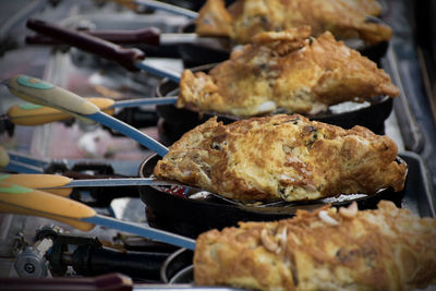 Close-up of meat on barbecue grill