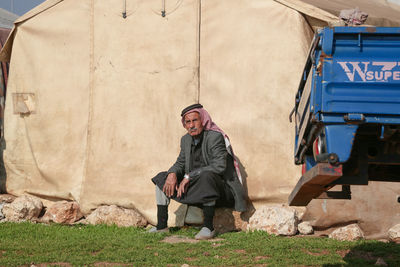 Portrait of a syrian old man living inside the refugee camp.