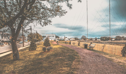 View of town against cloudy sky