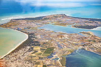 Aerial view of cityscape against sky